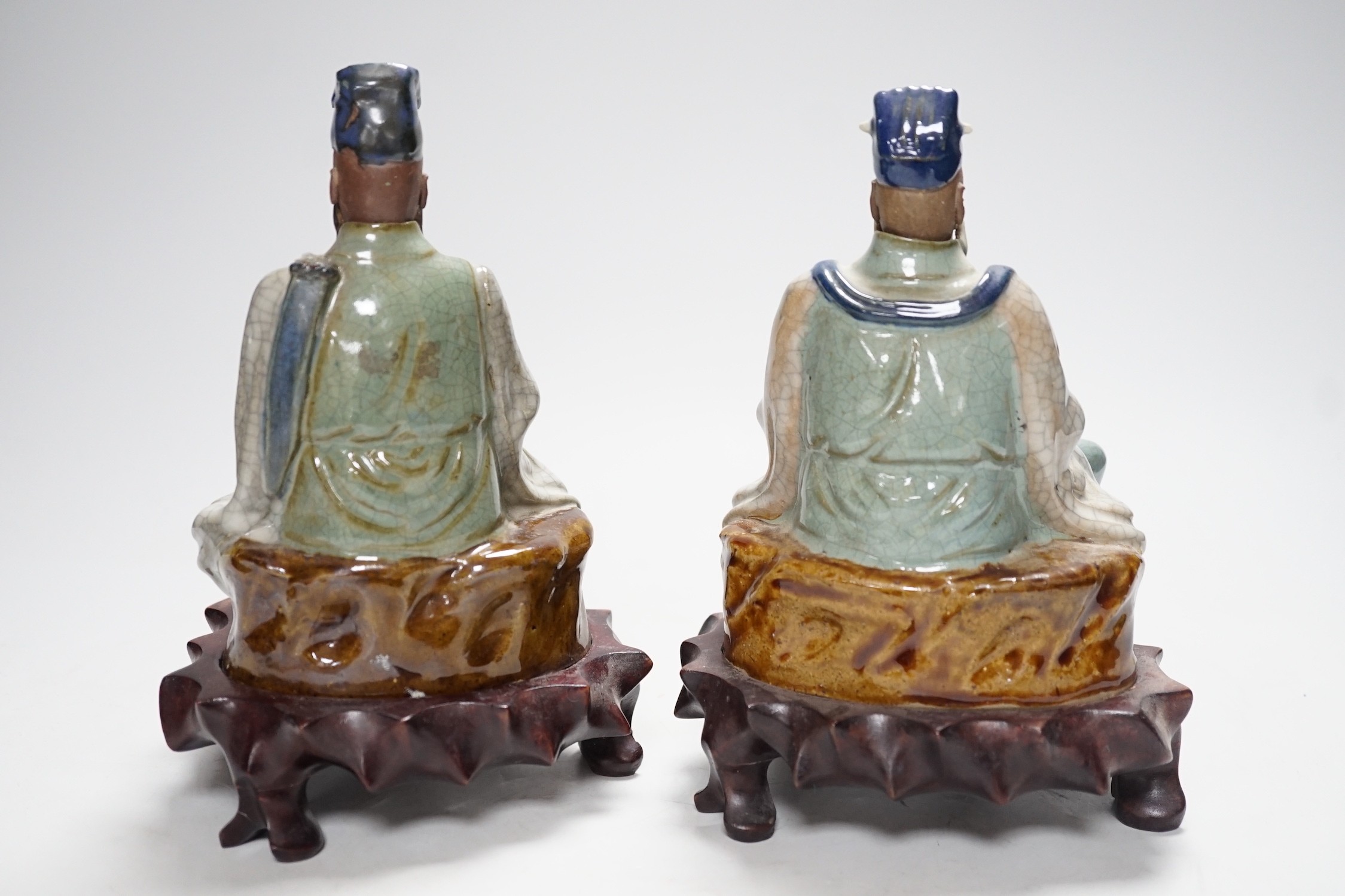 Two Shiwan stoneware figures of the Jade Emperor and Lu Dongbin, losses, 19cm